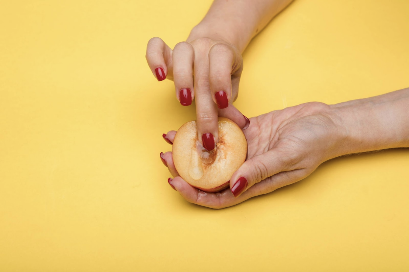 woman-fingering-juicy-apple
