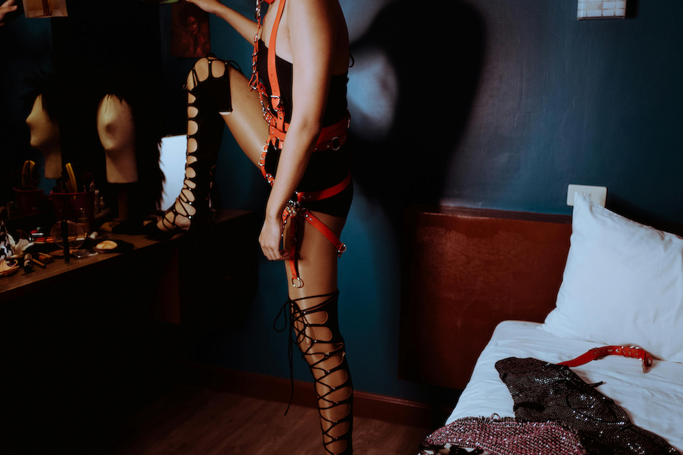 woman-wearing-orange-bondage-belt-lingerie-sex-roleplay