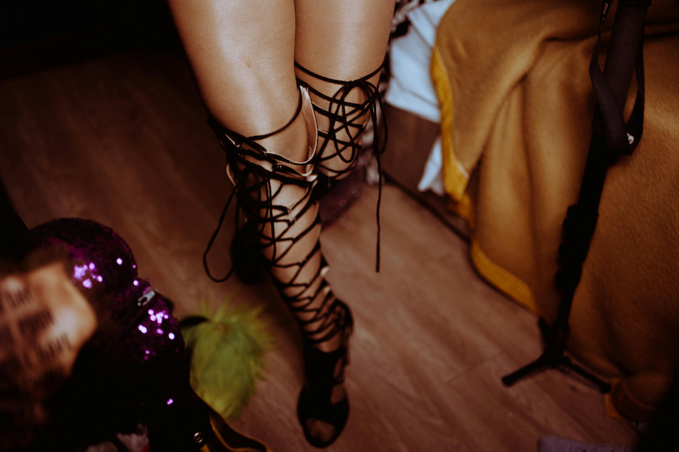 woman-wearing-black-strappy-heels-roleplay-costume